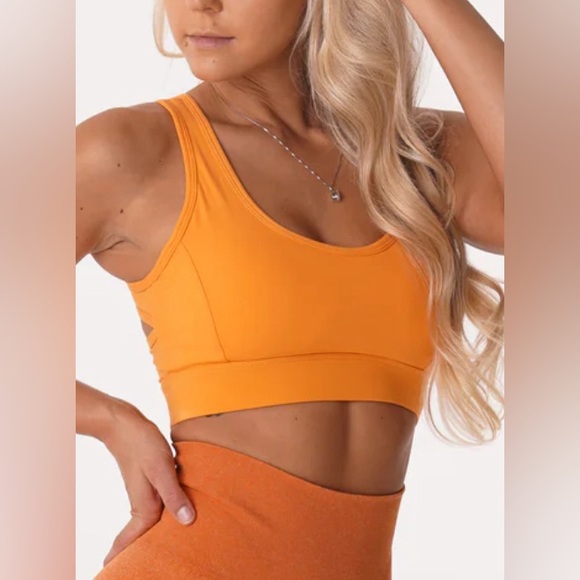 NVGTN sports bra Orange size Extra Small with bra clasps removable padding - Picture 2 of 6